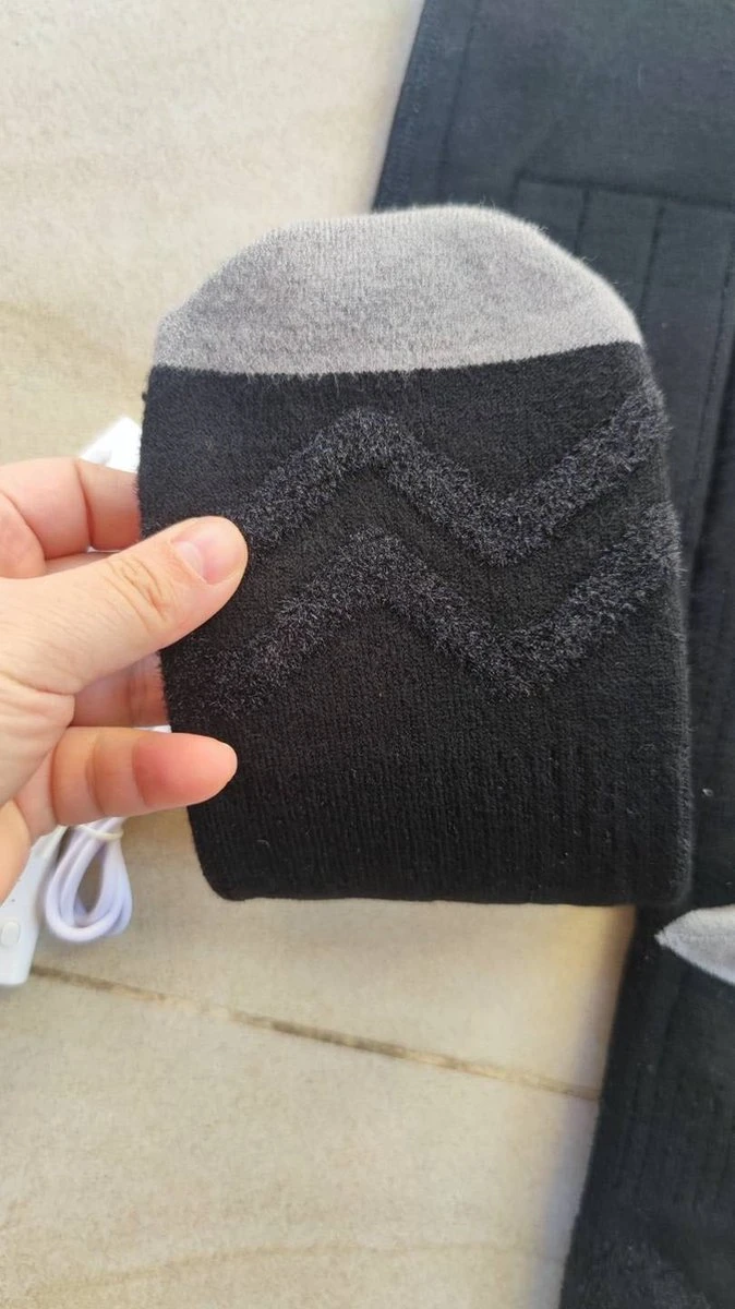Batterij Elektrisch Verwarmde Sokken - Oplaadbaar Batterijsokken - Unisex | Swim Chicky & Swim Hunky 9 Batterij Elektrisch Verwarmde Sokken - Oplaadbaar Batterijsokken - Unisex | Swim Chicky & Swim Hunky - Afbeelding 7